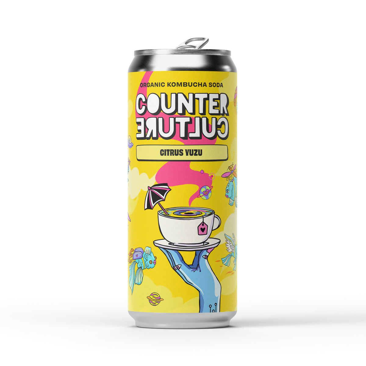 A can of Counter Culture Drinks Citrus Yuzu organic kombucha soda, with a yellow illustrated label of a blue hand holding up a steaming teacup among flying fish